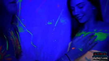 College teens glow in the dark orgy party in a dorm room