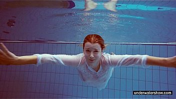 Cute Melissa plays underwater