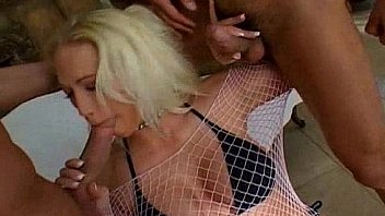 Hooker giving double BJ and swallowing cum