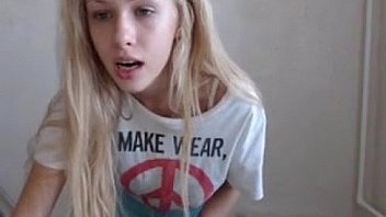 Cute blonde dances in front of camera