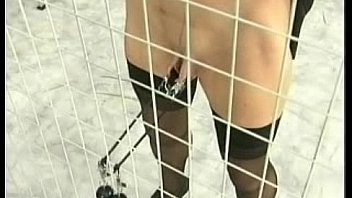Naughty girl in a jail got her big metal clamps with heavy weight on her tight pussy