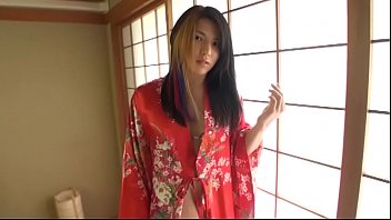 Lady Wrestler Hikaru Shida removing robe and massaging body NO NUDITY