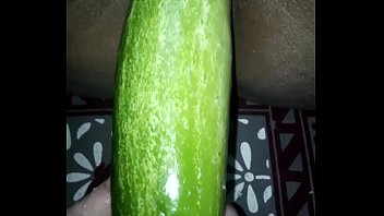 Desi wife eating cucumber