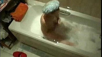 My kinky mum caught masturbating in bath tube by hidden cam