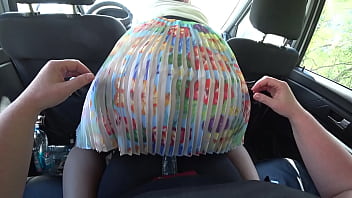A girlfriend in the car fucked a lesbian with juicy booty under her skirt.