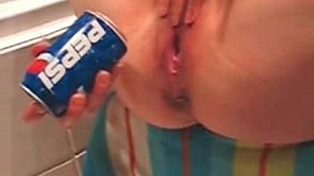 Sexy Horny Girl Inserts A Pepsi In Her Cunt