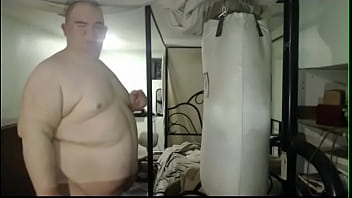 FatAssTinyDick spends around 2 min punh-ching or hitting a workout heavy-bag on camera