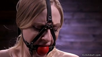 Gagged sub tied to a wooden chair